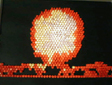 A nuclear explosion lovingly rendered in lite brite at approximately 8 ft. viewing distance.